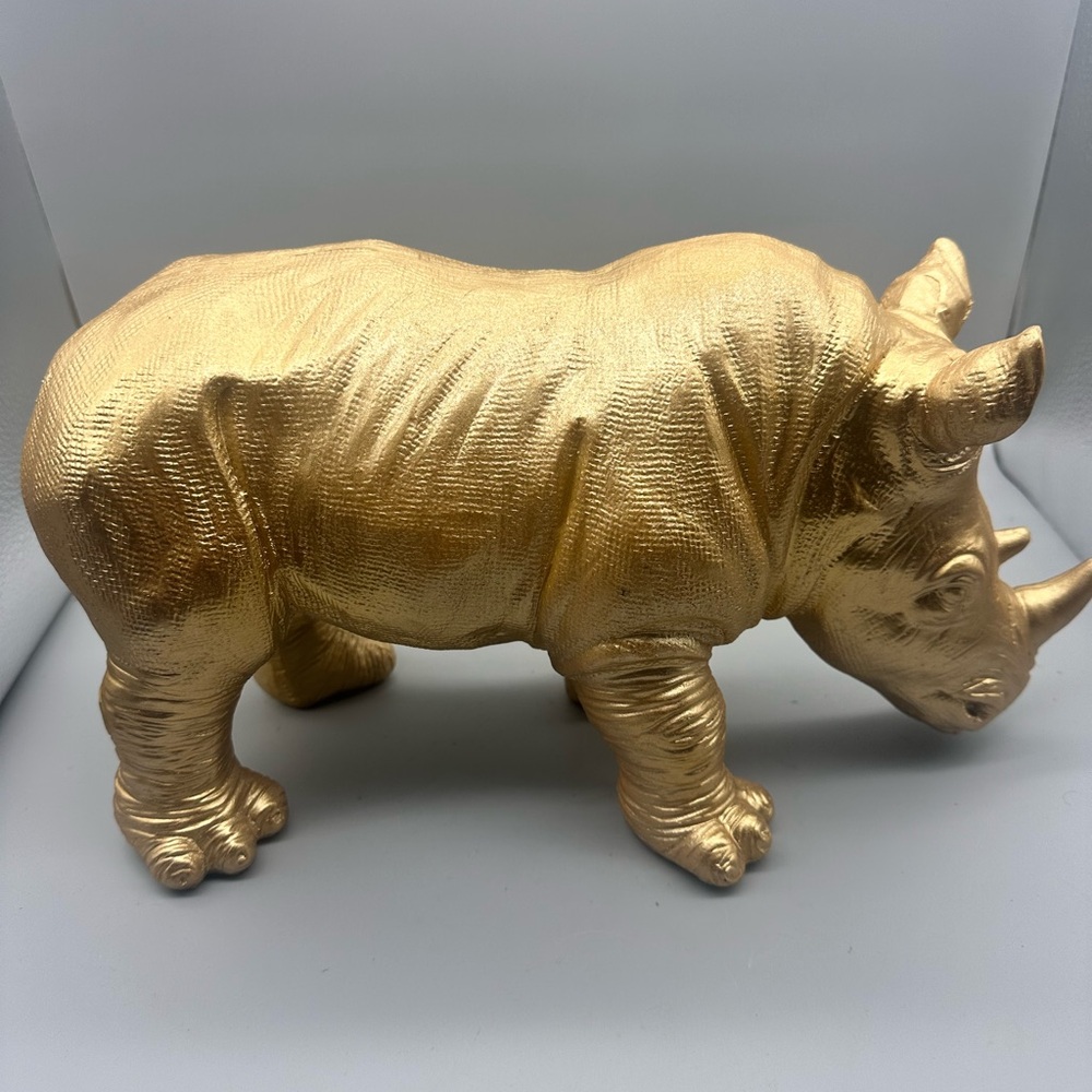 Resin hard plastic gold rhinoceros accent decor
